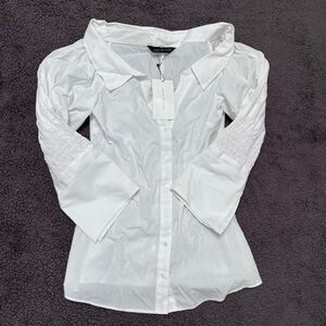 Zara brand new with tags long sleeve collared shirt. Size XS white never worn